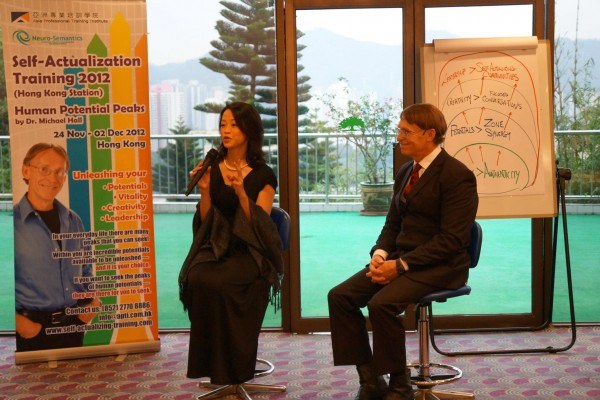 Original photograph of a self-actualization training discussion in Hong Kong.