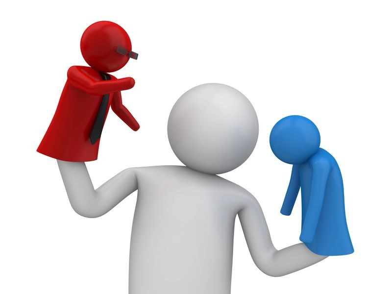 Original illustration of an internal critic using two glove puppets.